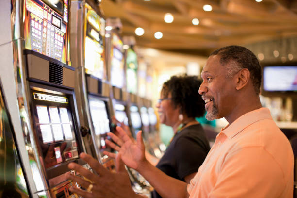Starburst slot game interface showing five reels and gem symbols